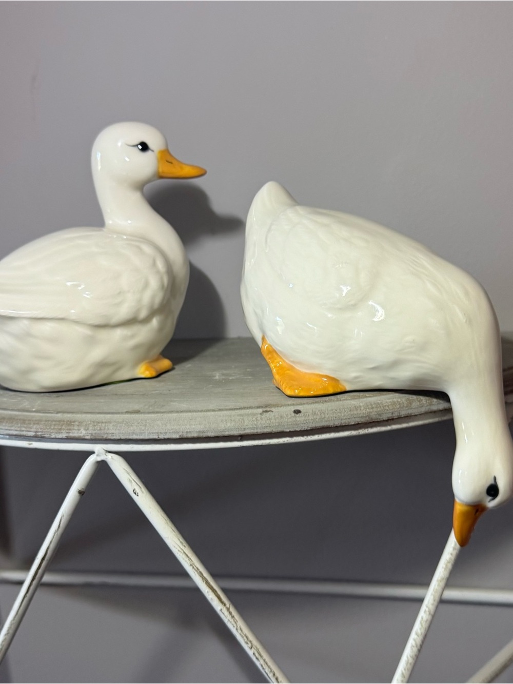 Glossy White Ceramic Duck Figurine Pair with Yellow Beaks
